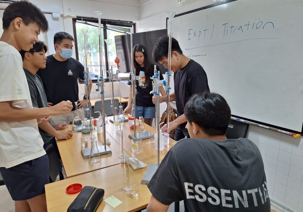 Students having a fun in chemistry practical